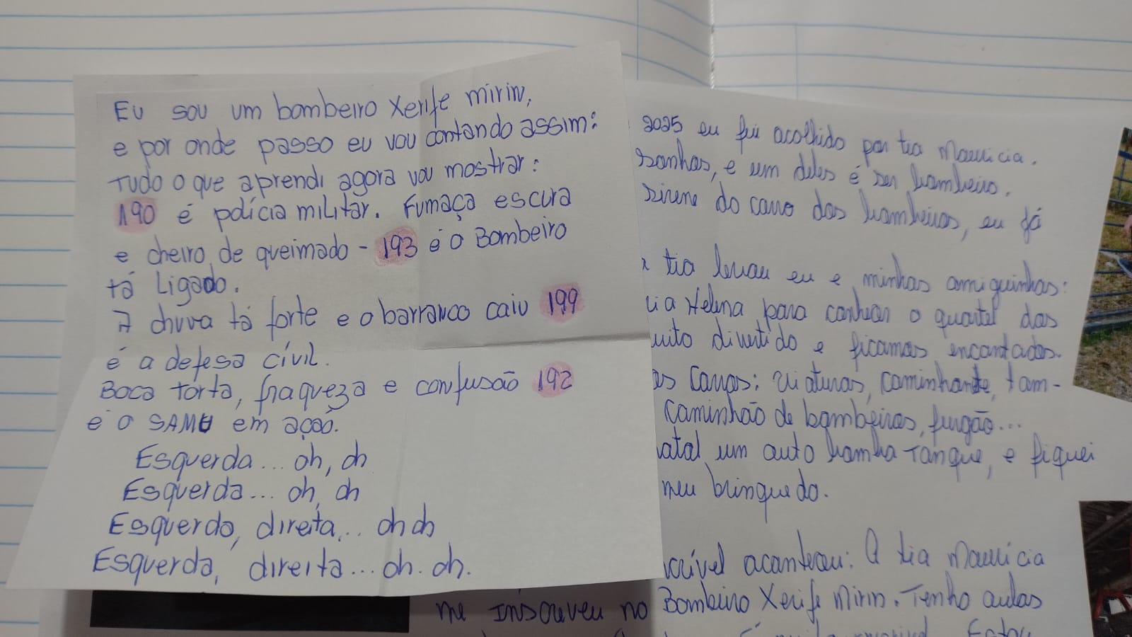 Cartinha escrita à mão por um aluno com os números de emergência